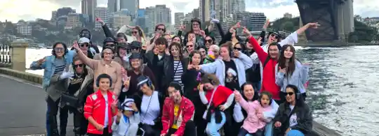 Disco Loco participants group photo on the beach